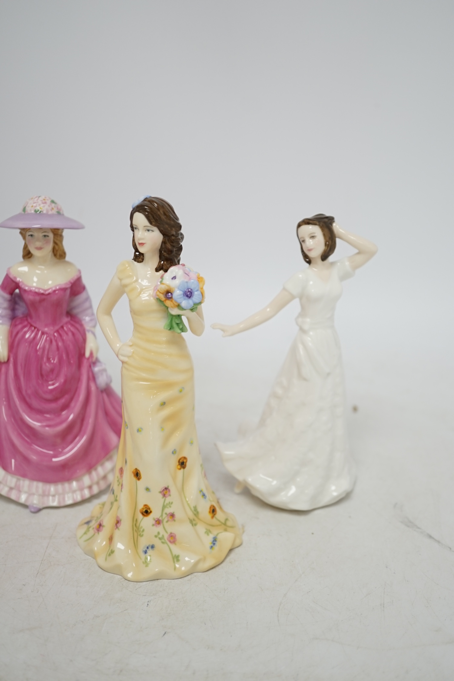 Seven Royal Doulton figures including Winters Day, Autumn Stroll, Spring Time and Summer Breeze, some with Certificates of authenticity, all boxed. Condition - good